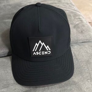 Melin Black Mountain Logo Snapback Hat